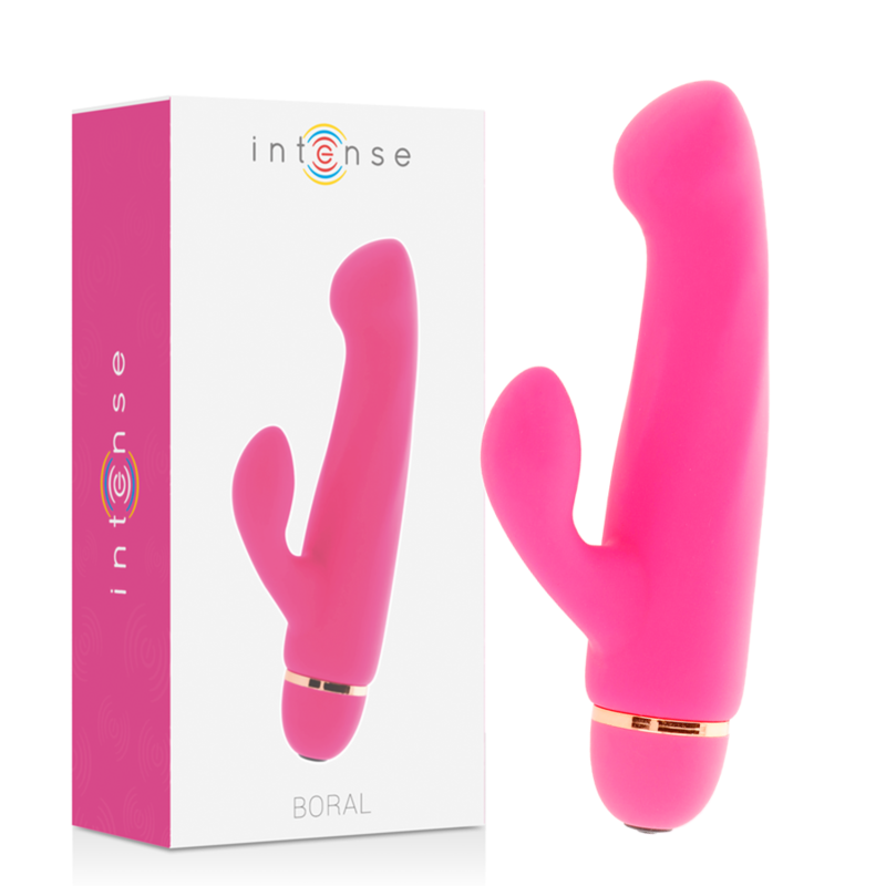 Pink silicone dual-stimulation vibrator with curved tip and gold-accented base next to matching product box.