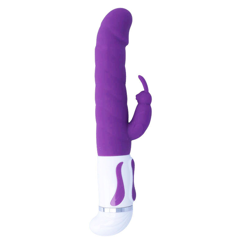 Lilac silicone vibrator with textured shaft, curved tip, and rabbit-style clitoral stimulator, white base with controls.