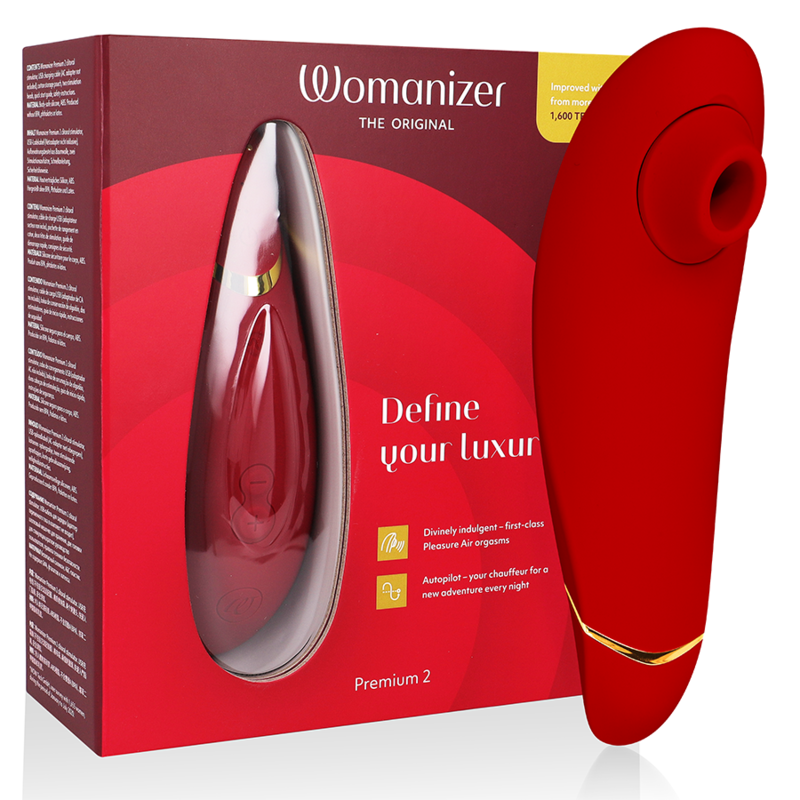 Bordeaux Womanizer Premium 2 clitoral stimulator with sleek ergonomic design and silicone texture next to matching red.