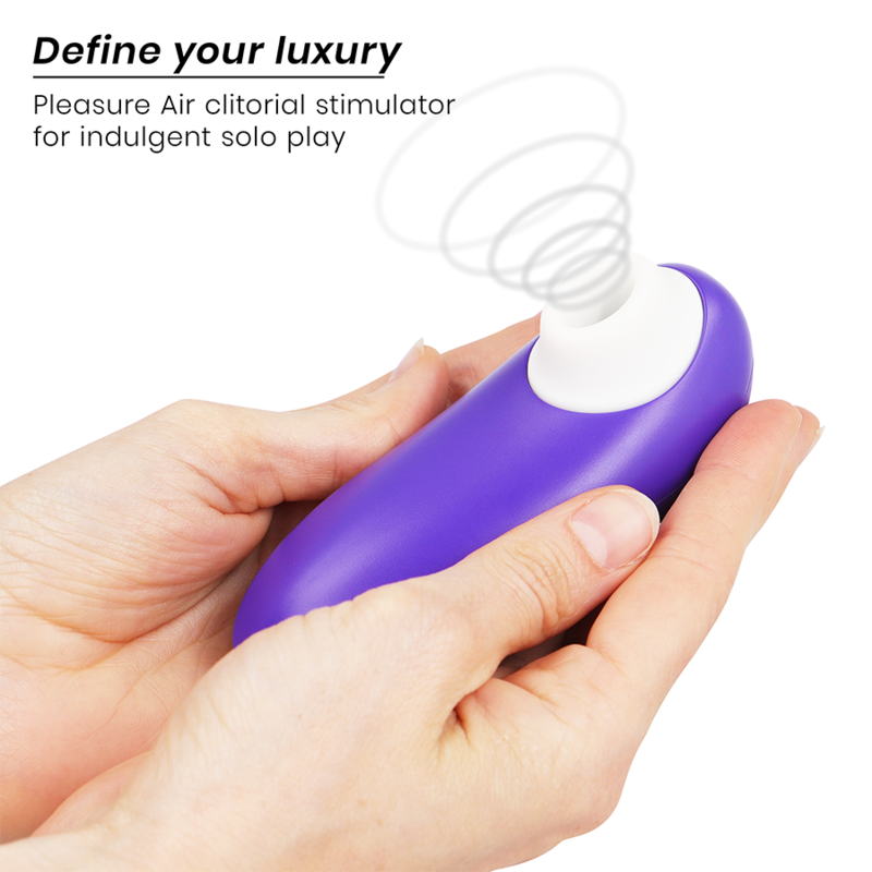 Indigo clitoral stimulator with ergonomic shape held in hands and air pulse feature illustration.