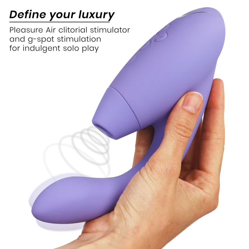 Lilac Womanizer Duo 2 stimulator with curved g-spot and air pulse clitoral stimulator held in hand.