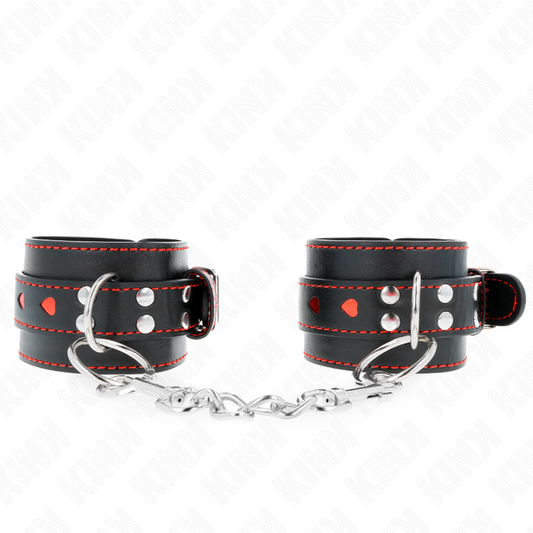 KINK – SCHWARZE HANDGELENKSFESSELN MIT ROTEM HERZ-INLAY, VERSTELLBAR 21–28 CM X 5,5 CM