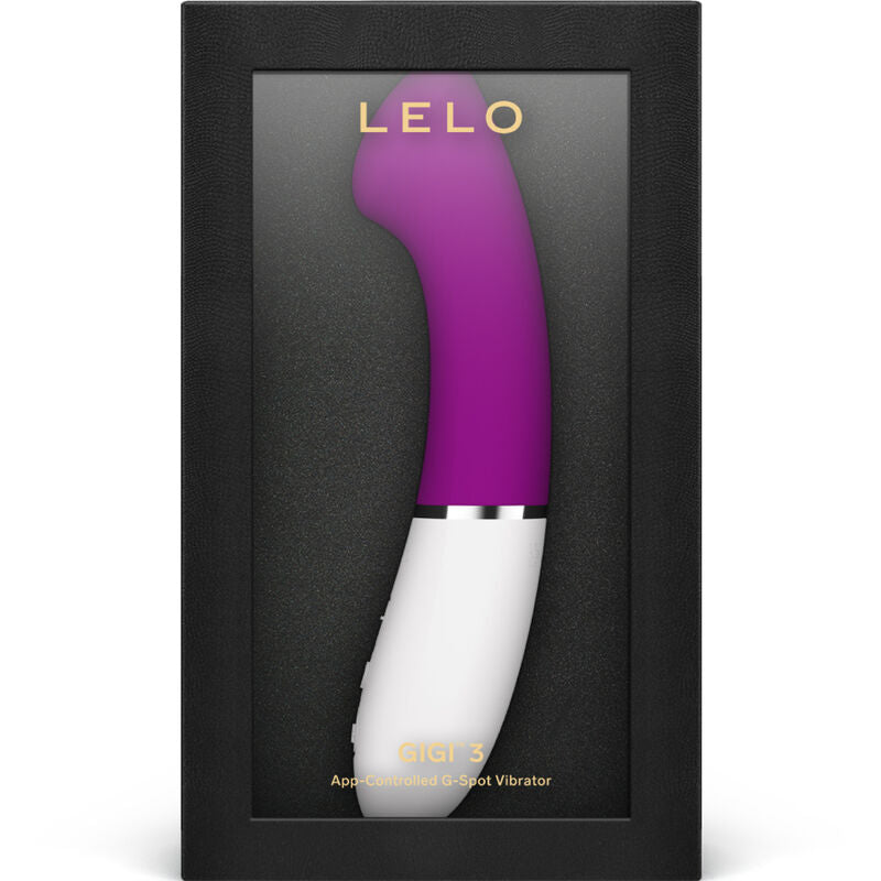 Curved purple and white G-spot vibrator with smooth silicone finish in black box packaging.