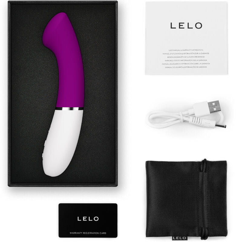 Pink and white curved silicone G-spot vibrator with USB charging cable, black storage pouch, and instruction manual in black .