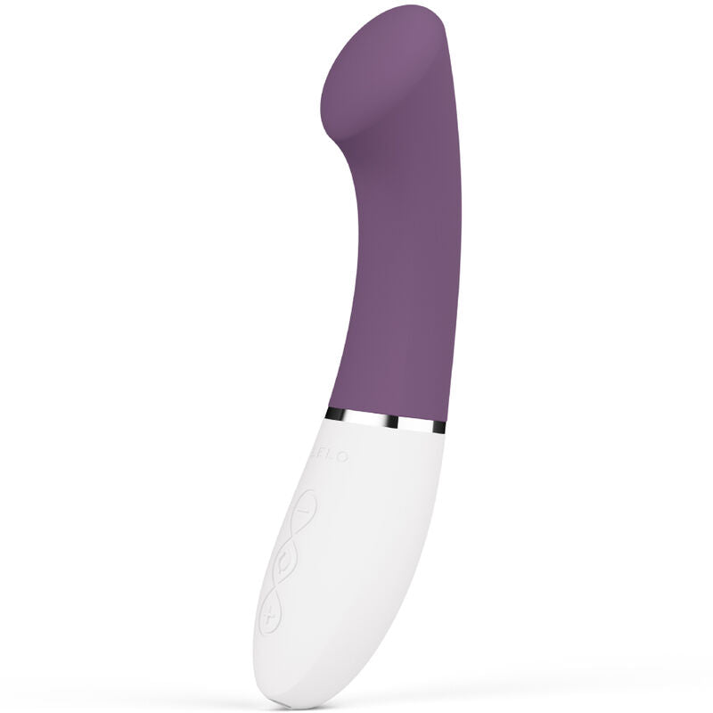 Violet curved G-spot vibrator with smooth silicone surface and white ergonomic handle.