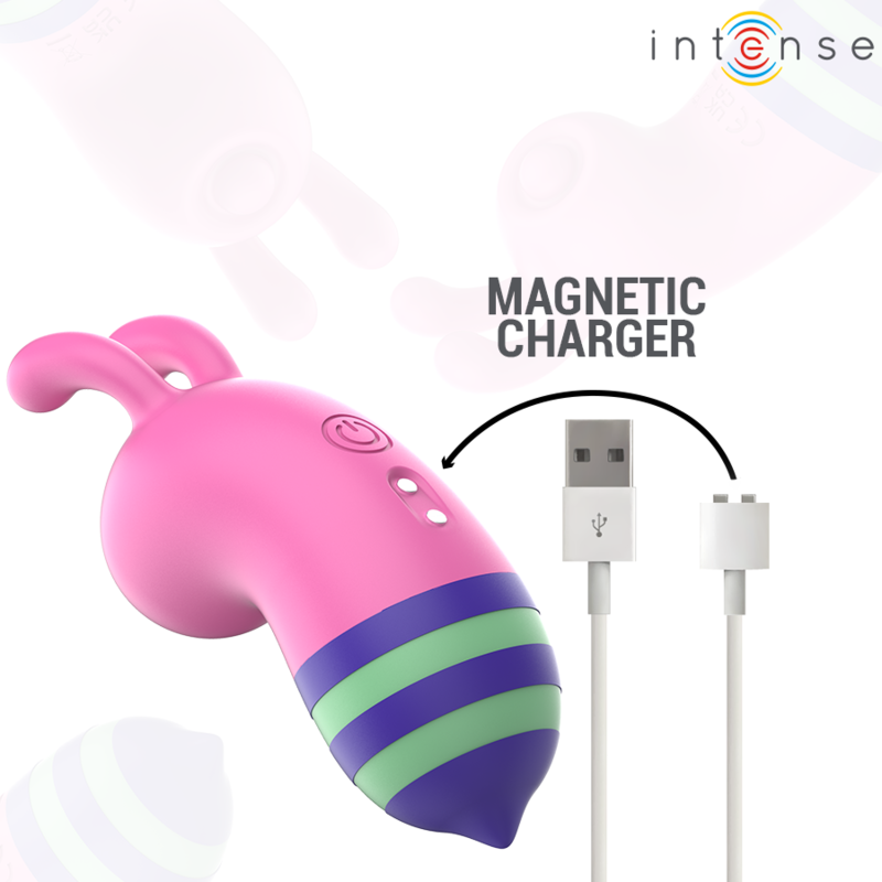 Pink silicone tongue stimulator with dual prongs, blue and green striped tip, and magnetic USB charger cable.