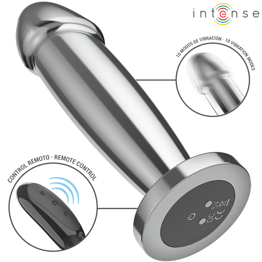 Smooth silver metal anal plug with a rounded tip and flat base, shown alongside a black remote control with buttons.
