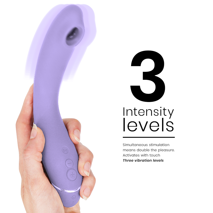 Lilac curved silicone vibrator with ergonomic handle and three control buttons, held in hand.