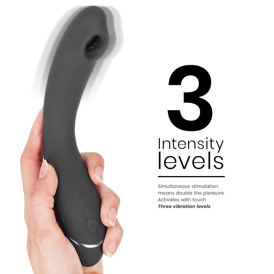 Slate gray curved G-spot vibrator with ergonomic shape and three control buttons held in hand.