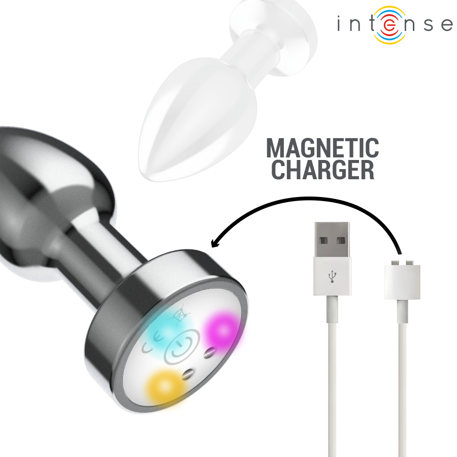 Small metallic anal plug with rounded tip, LED lights at base, and magnetic USB charger cable.