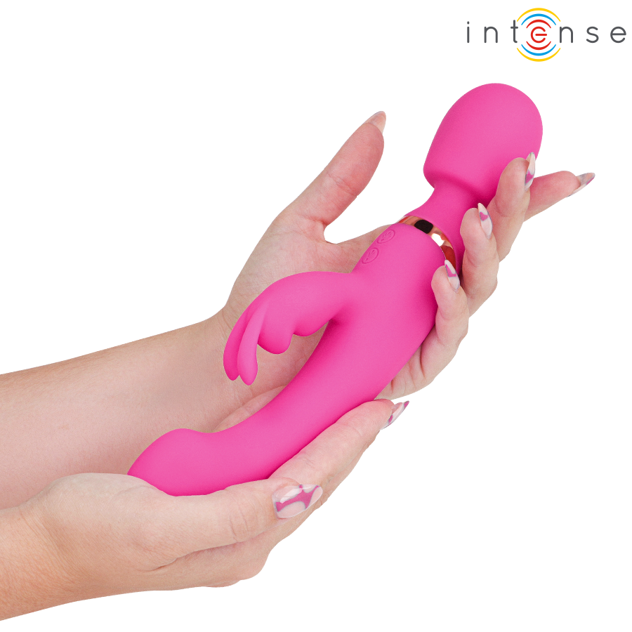 Pink silicone double vibrator with rabbit ears and wand head held in two hands.