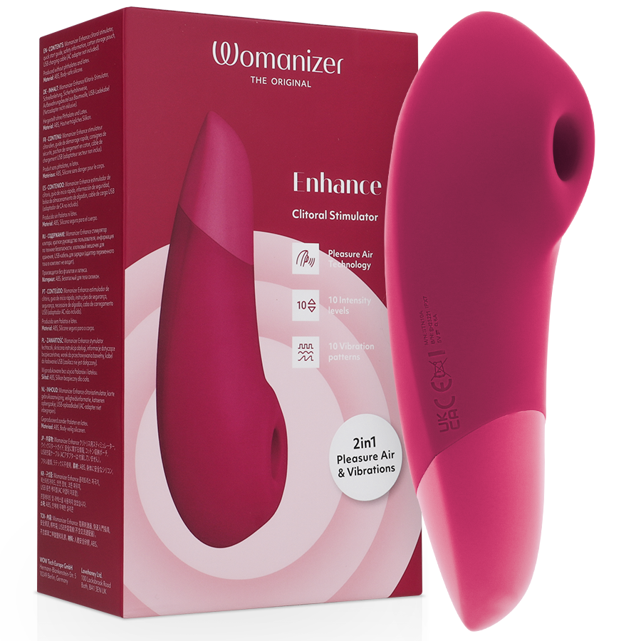 Vibrant pink Womanizer Enhance clitoral stimulator with smooth curved design and control button near base, shown with.