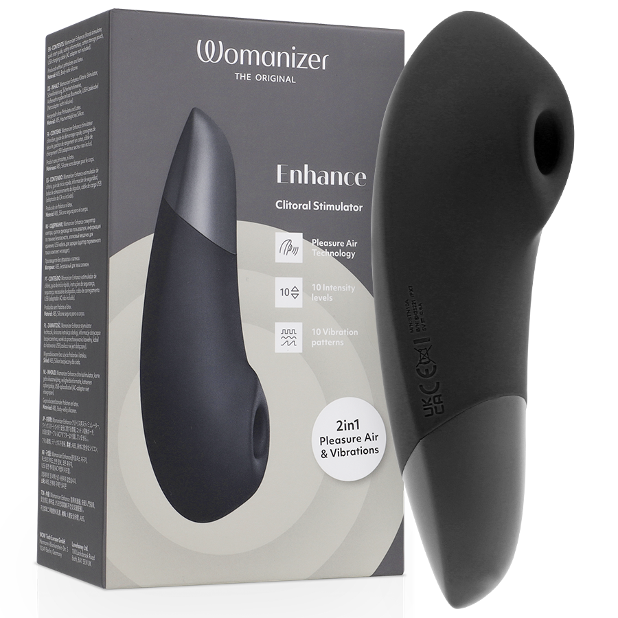 Black ergonomic clitoral stimulator with sleek curved design and silicone finish next to its gray and white packaging box.