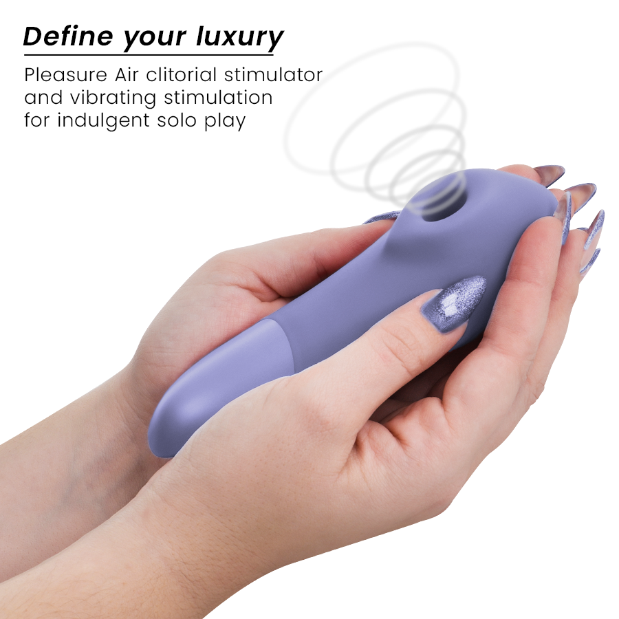 Lilac Womanizer Enhance clitoral stimulator with ergonomic curved design held in hand.
