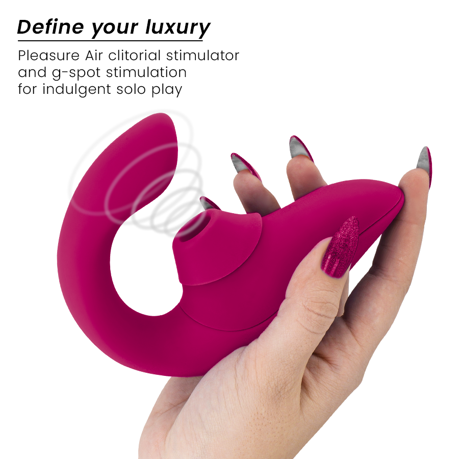 Vibrant pink rabbit vibrator with curved shaft and suction stimulator, held in hand.