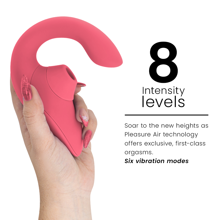 Vibrant rose pink rabbit vibrator stimulator with curved shaft and ergonomic handle in hand.