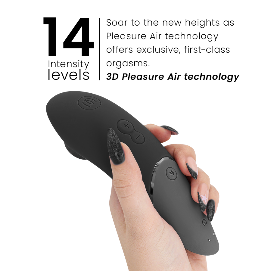 Black ergonomic clitoral stimulator with three control buttons held in hand with black manicured nails.