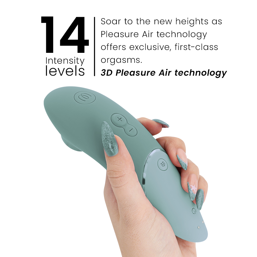 Sage green ergonomic clitoral stimulator with three control buttons held in hand with gray nails.