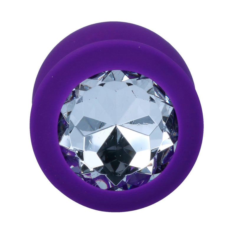 Lilac silicone anal plug with large clear faceted gem base.