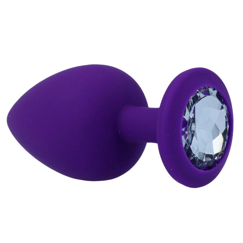 Lilac silicone anal plug with a large faceted crystal base and tapered tip.